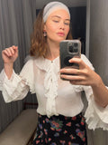 Pre-loved Aje. White Ruffle Blouse